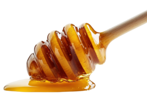 Honey dripping from a wooden dipper, a close-up view. png
