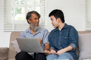 Communication and Learning. A grandfather and grandchild engaging in a meaningful conversation while learning together. photo