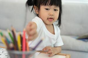learn toy blocks.family is happy and excited in the house. daughter having fun spending time, Activity, development, IQ, EQ, meditation, brain, muscles, essential skills. photo