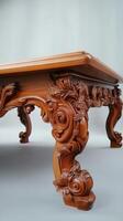 Intricately Carved Wooden Coffee Table With Ornate Legs photo