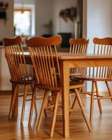 Wooden Dining Table With Matching Chairs In A Kitchen photo