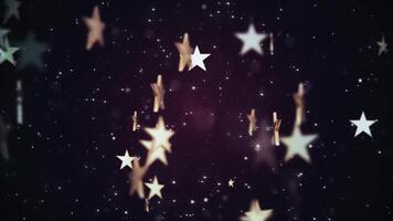 Shiny golden stars and glittering gold star particles on a dark gradient background. This luxury glitzy animation is suitable as an awards ceremony or talent show background. video