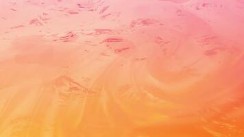 Abstract liquid effect background with soft flowing ripping waves and swirls on a warm red orange color gradient. Smooth fluid motion creates a serene calming atmosphere. video