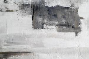Texture concrete wall with a painted layer of plaster and paint, gray and black architecture loft abstract background. photo