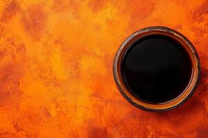 Top View Of Aged Balsamic Reduction On Vibrant Background With Copy Space, Food Setting photo