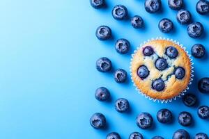 Top View Of Blueberry Muffin On Vibrant Background With Copy Space, Food Setting photo