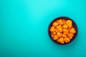 Top View Of Chicken Tikka Masala On Vibrant Background With Copy Space, Food Photography photo