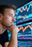 Stock trader analyzing real-time data on multiple computer screens displaying dynamic graphs and charts photo