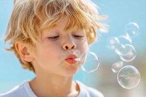 Child blowing bubbles in a sunny outdoor setting, capturing the joy and innocence of childhood playfulness, fun, and imagination, bubble play concept photo