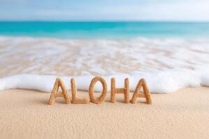 Sand letters spelling Aloha on a beach with gentle waves lapping at the shore, creating a serene atmosphere of relaxation and tropical vibes in a coastal setting photo