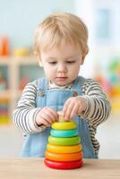 Young child engaged in autism occupational therapy session, stacking colorful rings on a wooden base, focusing on fine motor skills and cognitive development in a bright, playful environment photo