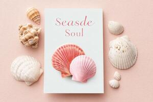 Colorful seashells arranged around a soft pink background with a decorative book titled Seaside Soul, creating a serene coastal atmosphere and inviting beach vibes photo