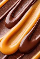 Close-up view of smooth, flowing chocolate and caramel sauces, creating an enticing pattern of rich textures and colors, perfect for dessert presentations and culinary designs photo