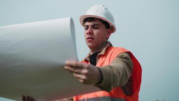 Engineer Taking A Look At The Project Map Outdoor video