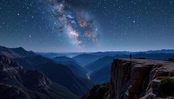 Majestic Night Sky over Mountain Range A Lone Figure Gazes at the Milky Way photo