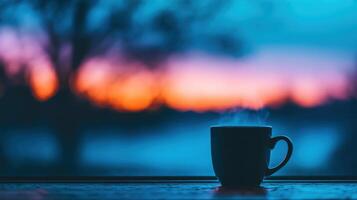 Serene Sunset View with a Warm Steaming Mug of Coffee or Tea Enjoying Peaceful Evening Atmosphere photo