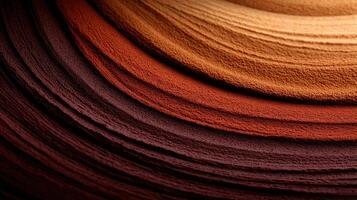 Abstract Background of Textured Earthy Tones Showing Layered Curving Patterns photo