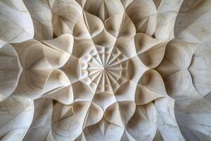 Intricate stone carving creating a stunning radial pattern on a building facade photo