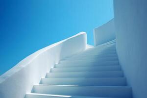 Whitewashed staircase ascending under blue sky in santorini, greece photo