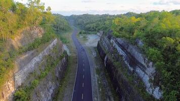aerial view of a road winding through a canyon video