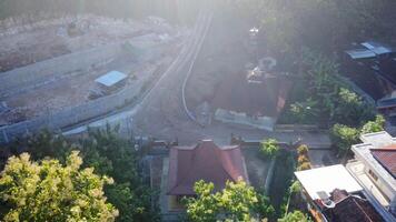 aerial view of a small village with a road and houses video