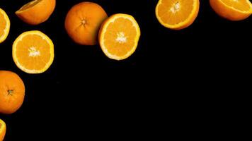 Fresh Oranges on a Black Background Perfectly Showcasing a Healthy Lifestyle Banner with copy space video