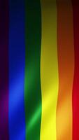 Seamless animated waving LGBT rainbow flag on fabric texture. Symbol of equality, pride, and inclusivity. Ideal for social campaigns, events, or support messages. 4k 60fps seamless loop. video
