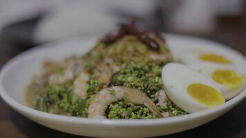 Zoom In Shrimp And Neem Flower Salad, footage for documentary and cinematic in food scene. video