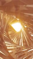 Abstract golden spiral tunnel with glowing center, creating a futuristic sense of movement and depth video