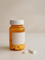 Amber pill bottle with a blank white label and yellow tablets inside, placed beside three white pills on a smooth surface. Ideal for pharmacy branding, medical ads, or health awareness campaigns. photo