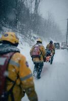 A team of emergency rescuers carries an injured person on a stretcher through a snow-covered rural forest road. Captures teamwork, survival, and response to extreme winter emergencies. photo