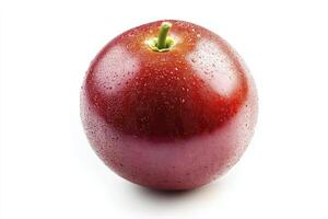 A red fruit is shown on a white background photo