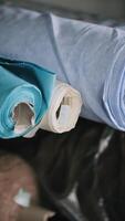 Assorted fabric rolls for tailoring use video