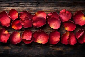 Elegant Arrangement of Red Rose Petals on Rustic Wooden Background for Romantic Decor photo