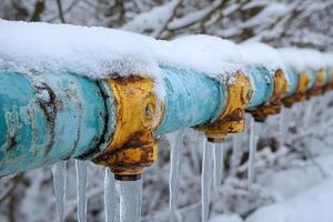 Winter Landscape with Snow-Covered Pipes and Icicles for Industrial Design photo