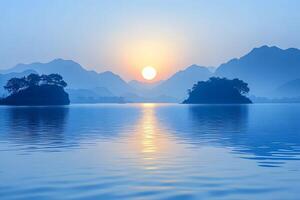 Tranquil Sunrise Over Misty Mountain Lake for Relaxation and Nature Themes photo