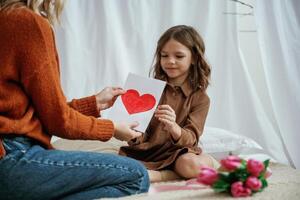 Conception of,, mother's, day celebration. Parent with daughter at home photo