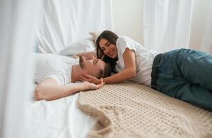 Young, couple are together at home photo