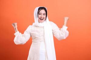 Victorious Muslima, A Portrait of Joyful Triumph, radiating posi photo