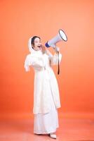 Empowered voice, Woman using megaphone, embodying influence and photo
