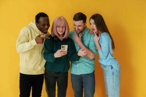 Group, of, friends, are in the studio against background photo
