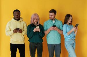 Group of friends, are ,in ,the studio against background photo
