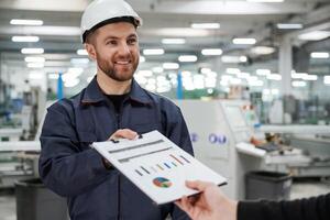 Giving the document, with ,,plan. Man on the factory is making deal with other person photo