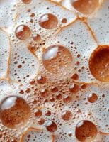 Close up of coffee bubbles and foam photo