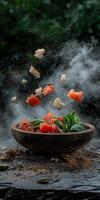 Rustic tomato salad with basil and bread in motion photo