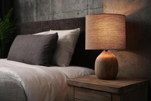Cozy bedroom interior with illuminated lamp on nightstand photo