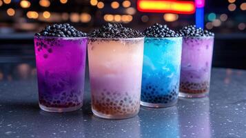Colorful boba drinks with tapioca pearls on a bar photo