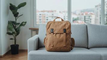 Cozy apartment with stylish backpack resting on sofa, creating warm atmosphere photo