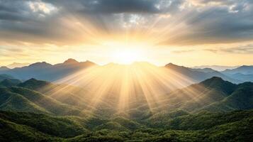 Breathtaking sunrise over mountain ridge with beams of light illuminating landscape photo