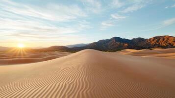 Golden sand dunes rippling in soft wind beneath vibrant sunset, creating serene landscape photo